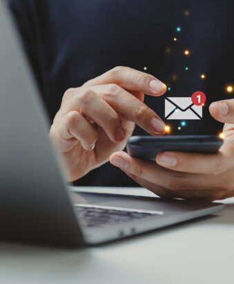 Hand,Of,Businessman,Using,Smartphone,For,Email,With,Notification,Alert,